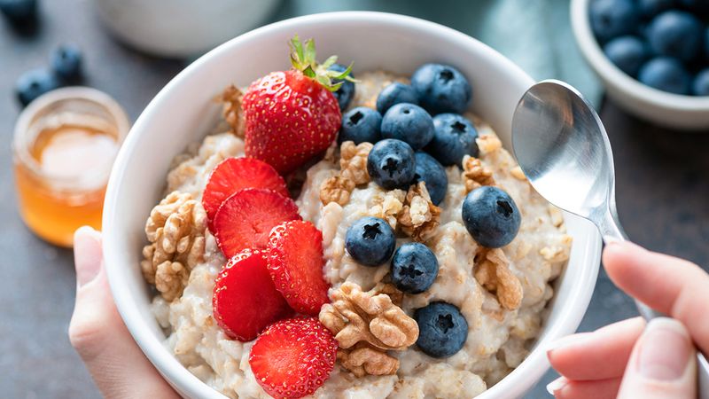 Focus on a diet rich in whole grains, fiber-rich berries, fruits, and vegetables, as well as healthy fats from nuts and seeds, among other sources.