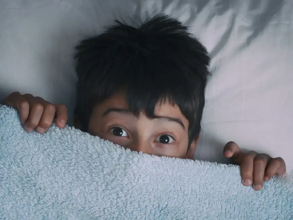 Being afraid of the dark is very common among children.